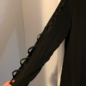 Knee length black fitted dress